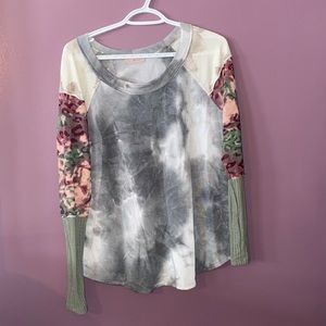 Long sleeved Ces Femme shirt.